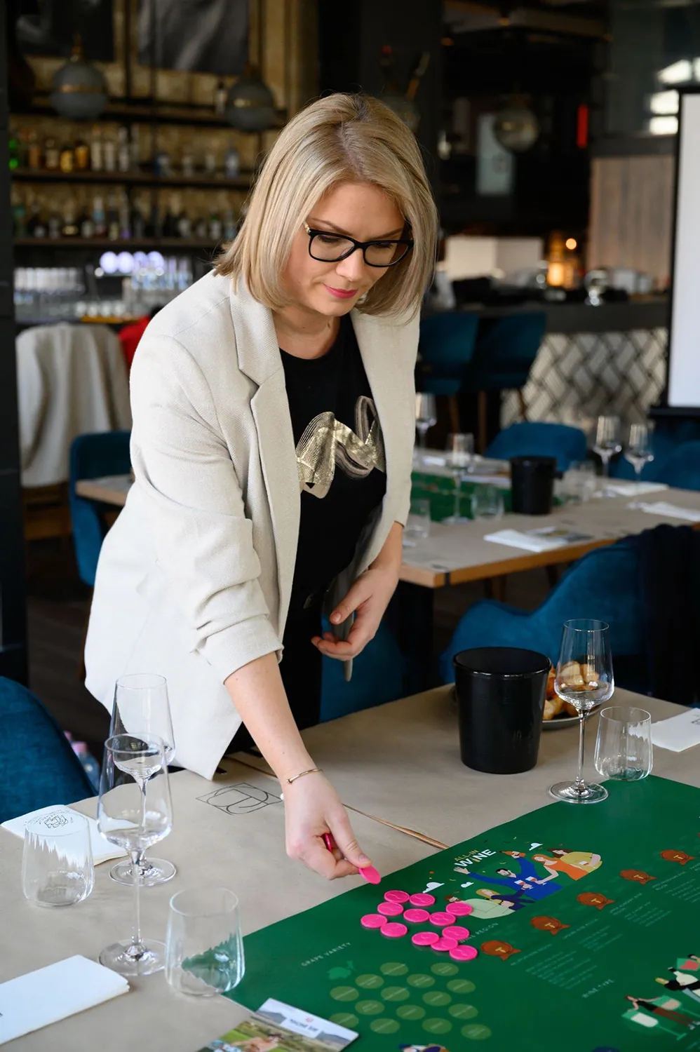 Player placing chips on the game board